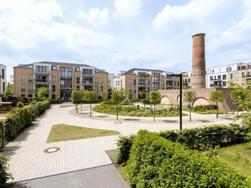 HOCHWERTIGE 2-RAUM-GARTENWOHNUNG MIT PARKETT, FUSSBODENHEIZUNG UND TOP-BÄDERN
