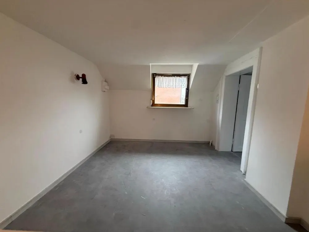 2-Zimmer-Wohnung mit Hauscharakter in Alt-Meschenich