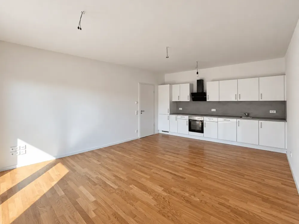 NEW BUILDING AT NEUER PARK | A Home with Open Living Area and West Balcony