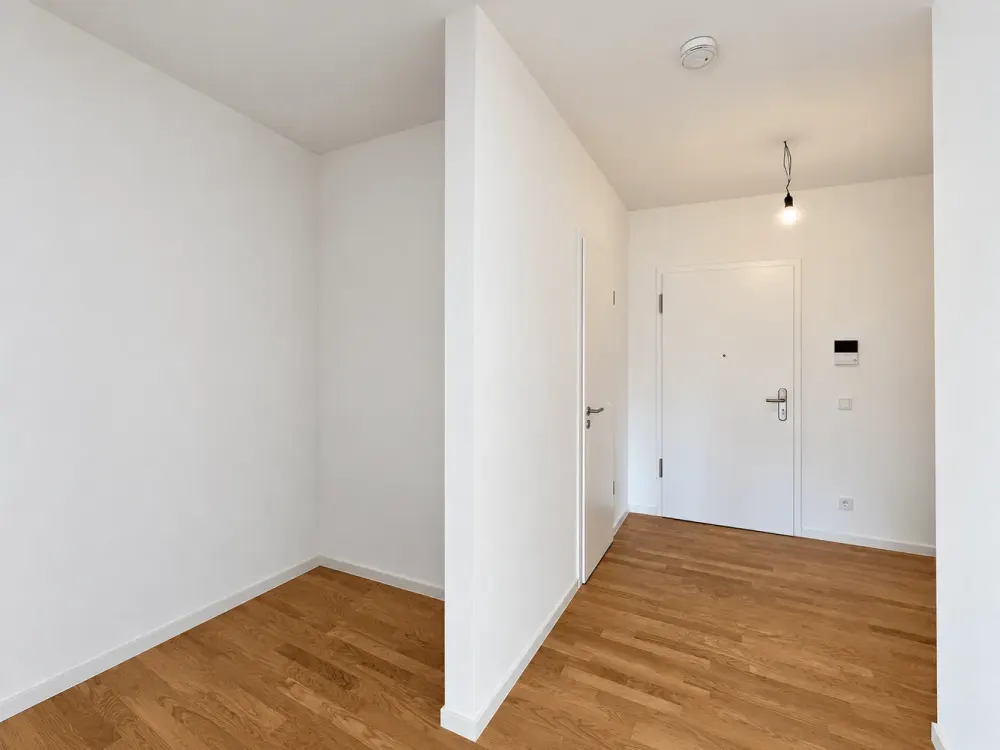 NEW BUILDING AT NEUER PARK | A Home with Open Living Area and West Balcony