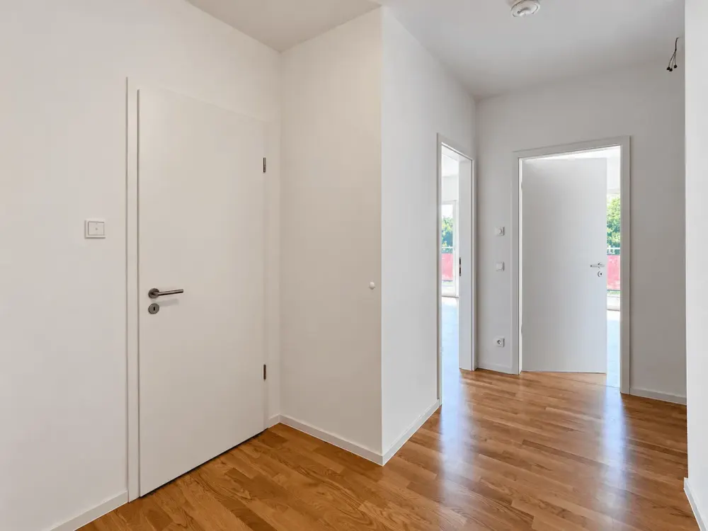 NEW BUILDING AT NEUER PARK | A Home with Open Living Area and West Balcony