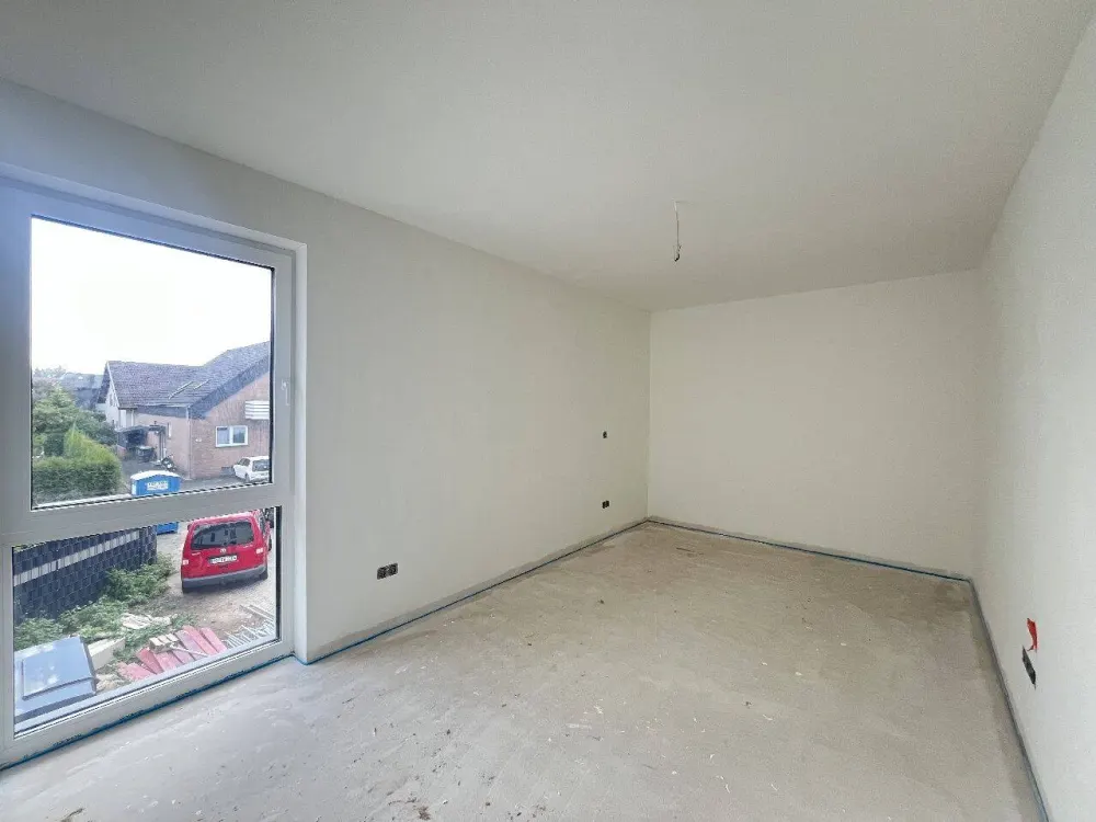 Erstbezug: 3-Zimmer-Wohnung im Obergeschoss mit Balkon