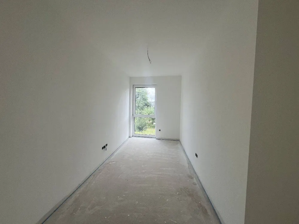 Erstbezug: 3-Zimmer-Wohnung im Obergeschoss mit Balkon