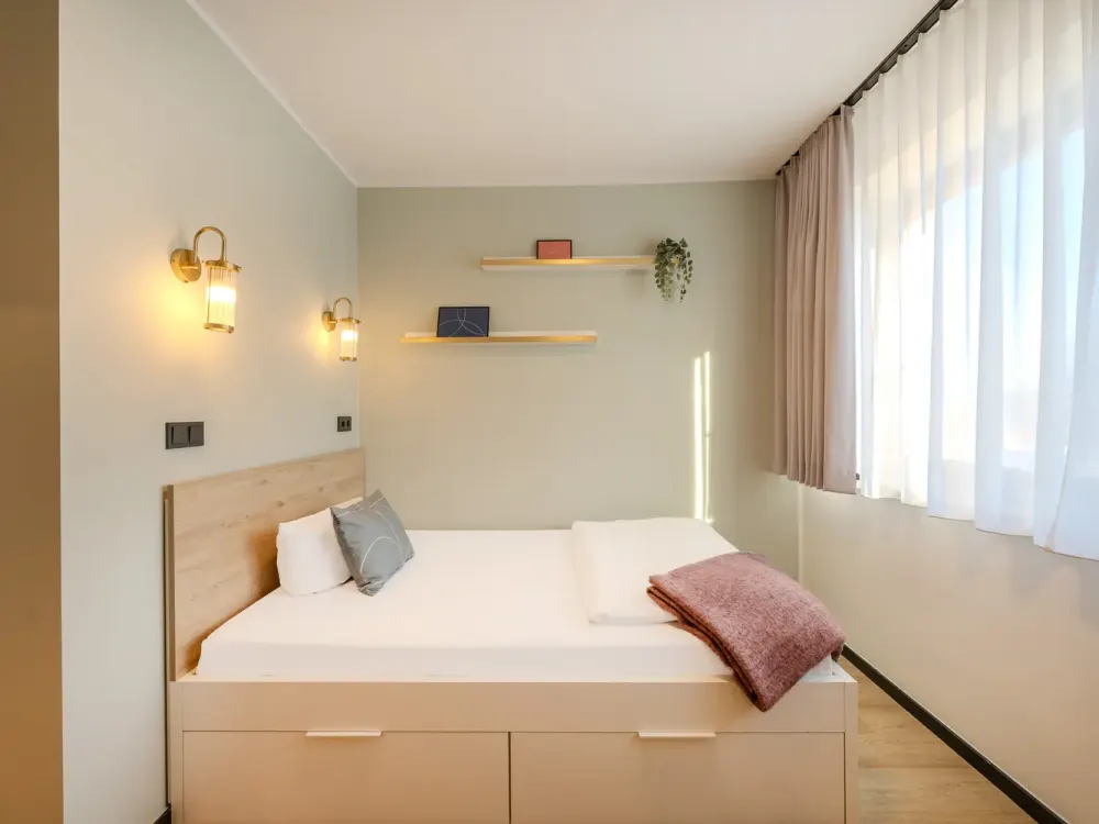 Furnished micro apartments with community spaces, coworking and gym