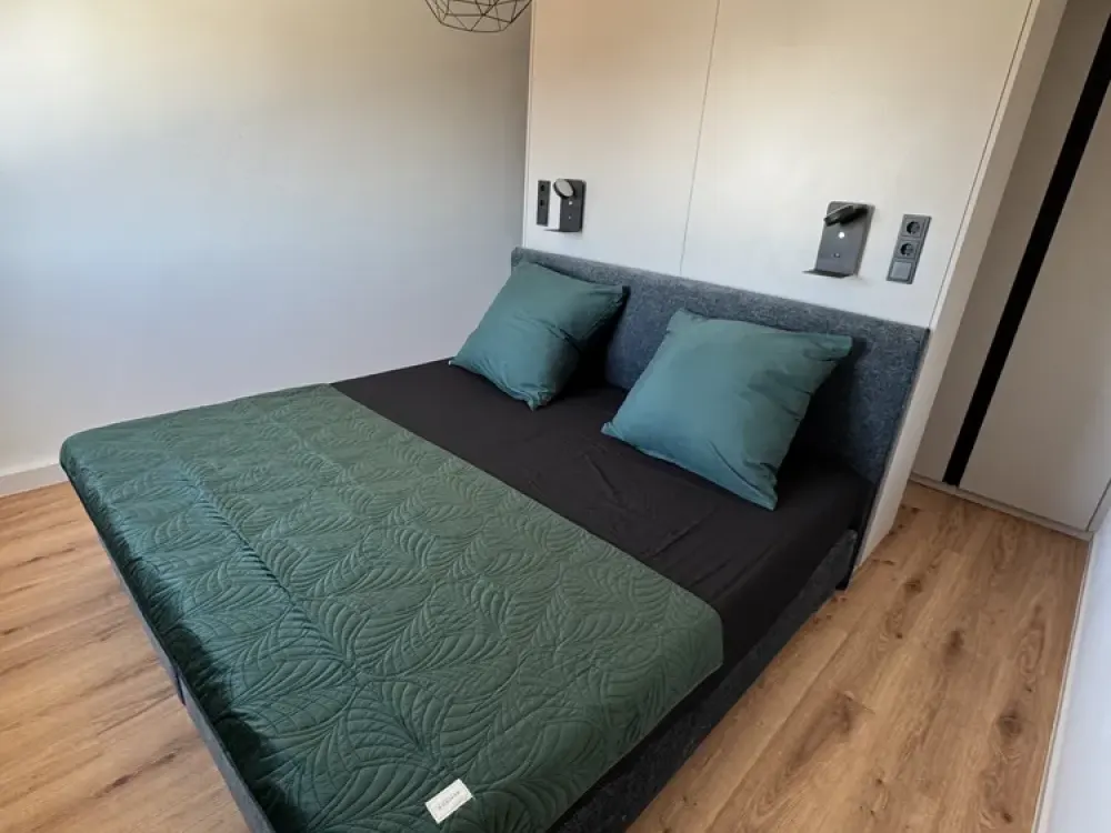 Modern 2-Room Attic Apartment with Panoramic View and Stylish Features on the 6th Floor