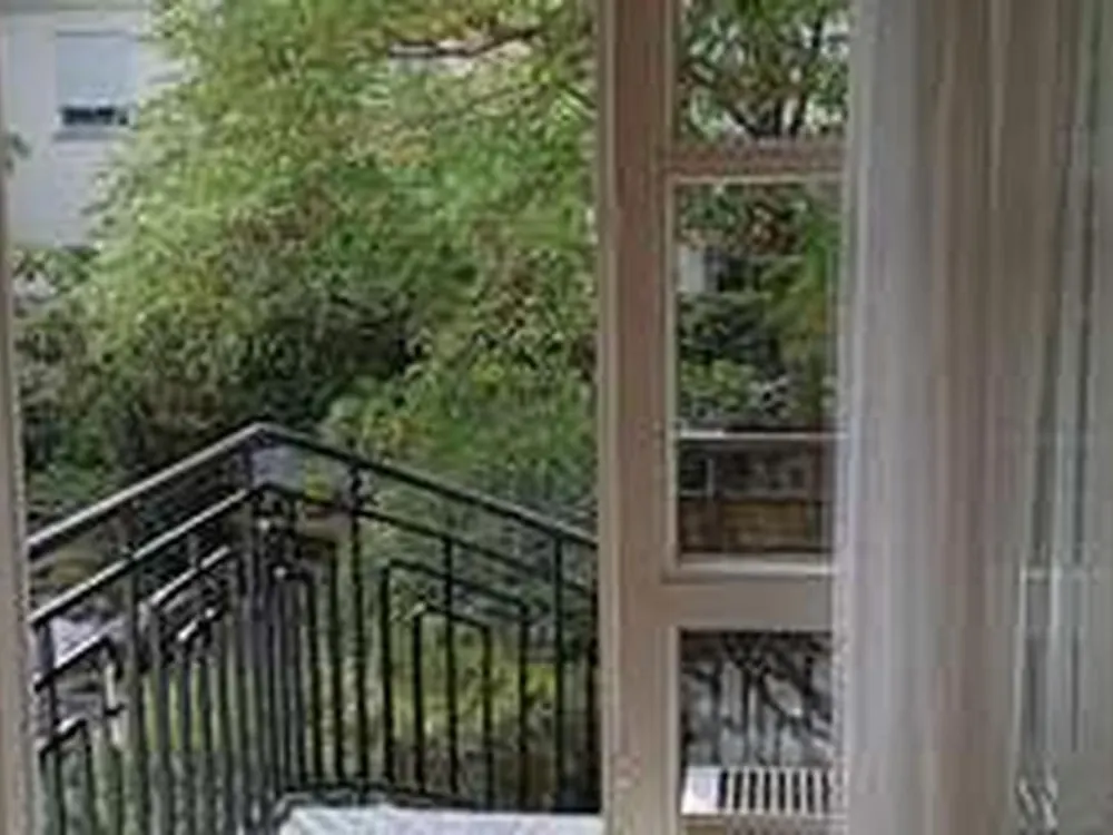Beautiful, furnished garden apartment, central and quiet, with large garden share