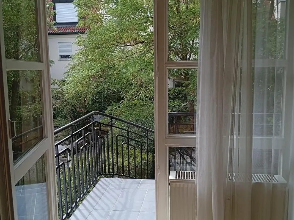 Beautiful, furnished garden apartment, central and quiet, with large garden share