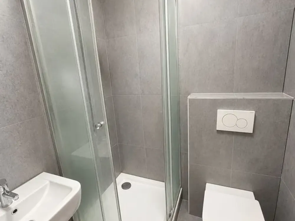 Gepflegte 1,5-Zimmer-Souterrainwohnung mit Fußbodenheizung und Einbauküche
