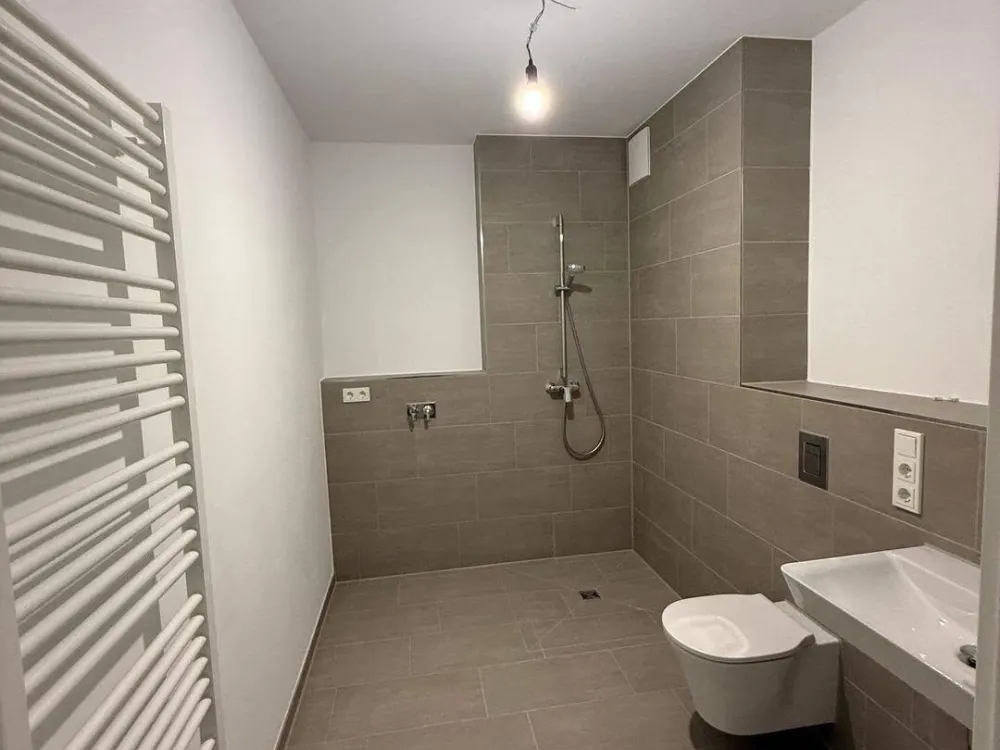 3-Zimmer-Neubau, zentral, EG, Erstbezug, ruhige Lage im Hinterhof