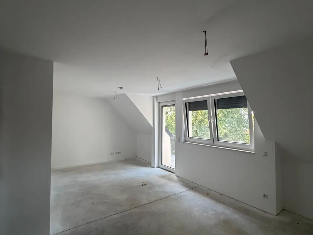 Moderne Dachgeschoss Wohnung im Neubau