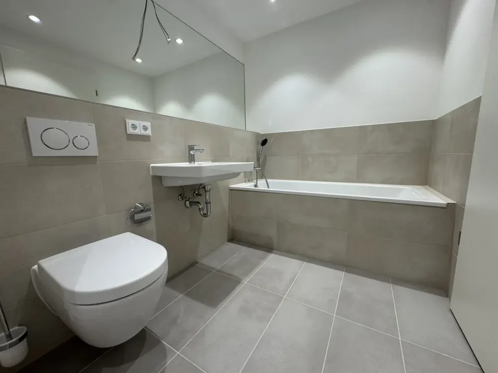 First occupancy!: 4-room apartment on the ground floor with balcony