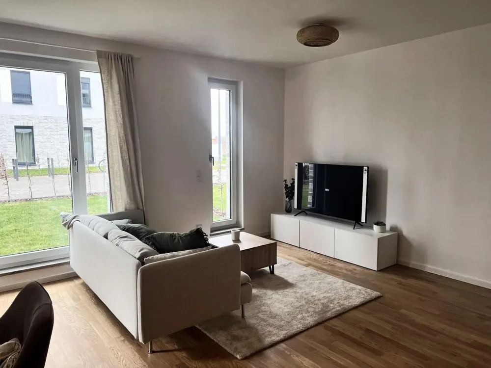 Erstbezug/Neubau Stilvoll eingerichtete Erdgeschosswohnung mit Garten