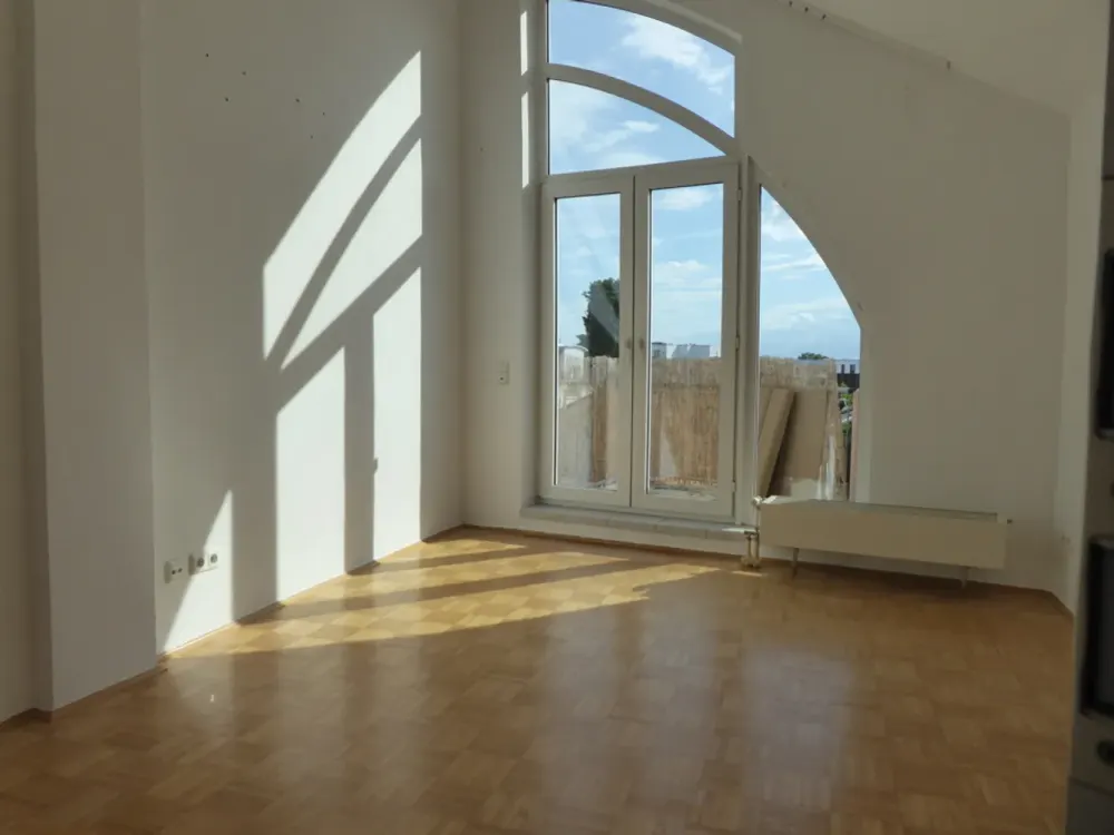 Exklusive Maisonettewohnung mit zwei Balkonen und Tiefgaragenstellplatz in begehrter Bestlage!
