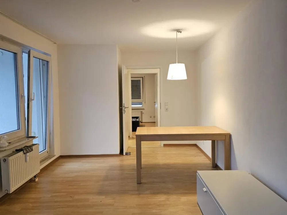 Unmöblierte 2-Zimmer-Wohnung mit TG, Garten und Balkon