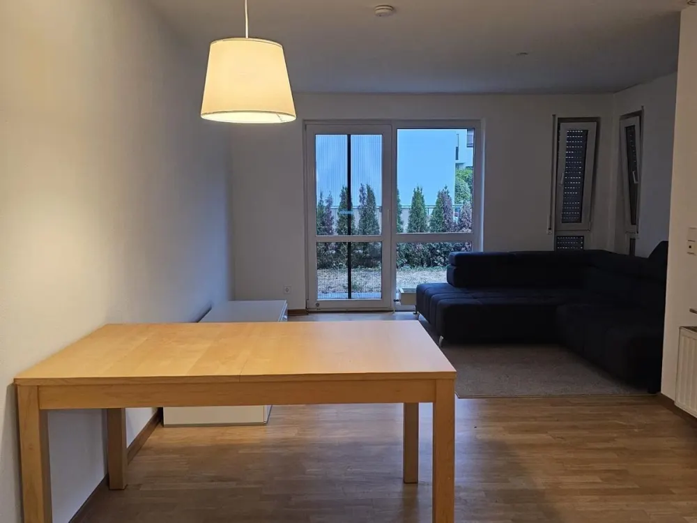 Unmöblierte 2-Zimmer-Wohnung mit TG, Garten und Balkon