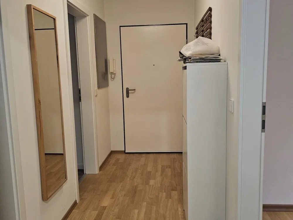 Unmöblierte 2-Zimmer-Wohnung mit TG, Garten und Balkon