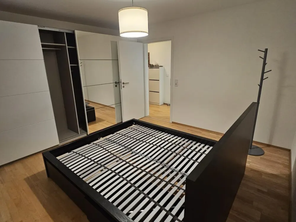 Unmöblierte 2-Zimmer-Wohnung mit TG, Garten und Balkon