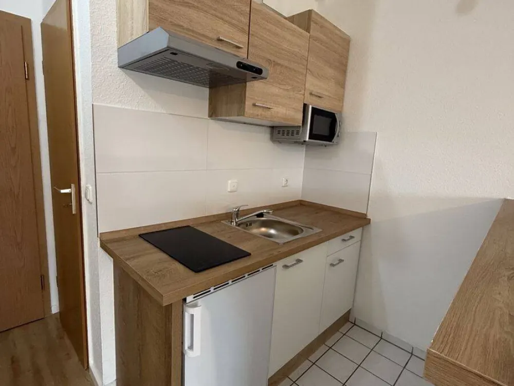 Attractive 2-Room Maisonette Apartment with Kitchenette, Balcony and Parking Space