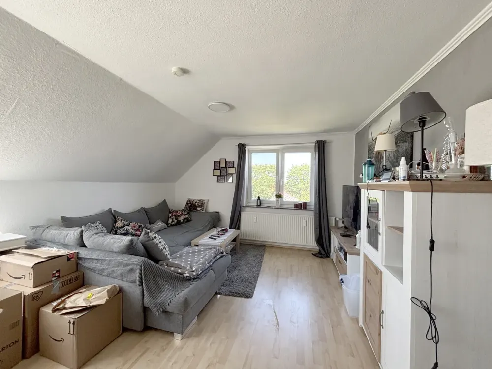 Ruhige 3-Zimmer-Dachgeschosswohung mit Garten und Balkon in Riede