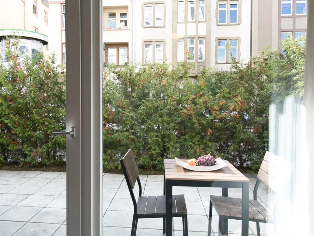 Einzimmerwohnung mit Garten und Terrasse