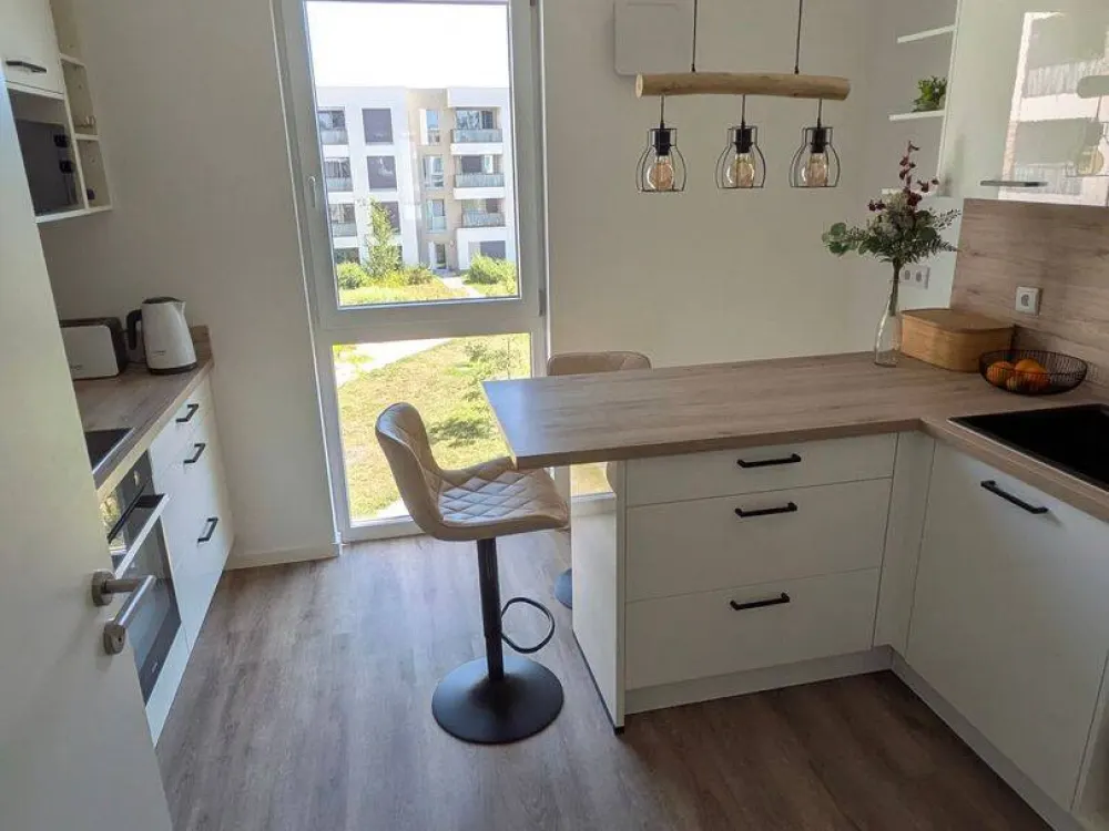Looking for a new tenant for modern 3-room apartment with fitted kitchen + corner balcony after first occupancy