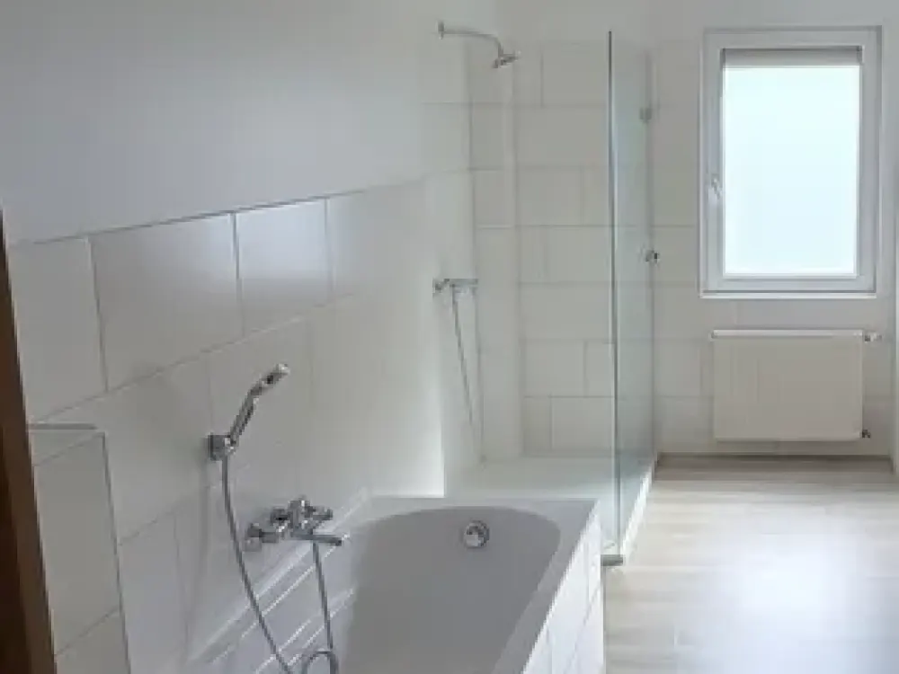 Charmante 3,5-Zimmer-Wohnung mit eigenem Garten und Garage in ruhiger Bestlage im Hochparterre