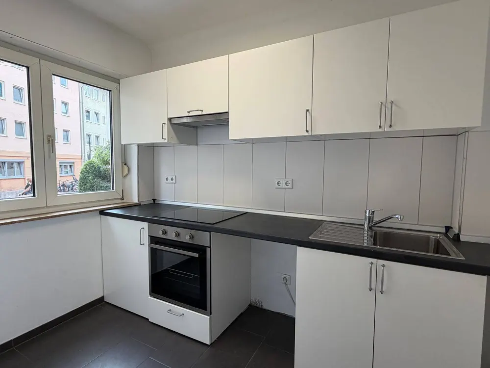 sanierte 1-Zimmer-Wohnung mit Balkon und Einbauküche in zentraler Lage