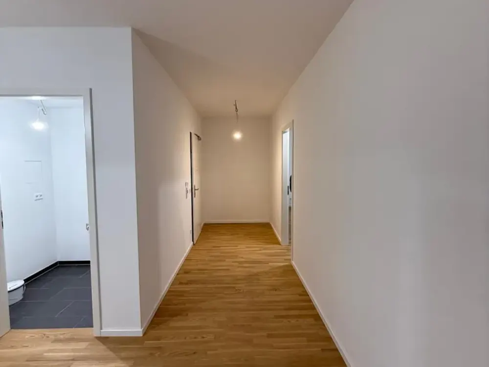 Charlottes Garten: Neue 4 Zimmer-Wohnung mit Garten und Tiefgarage