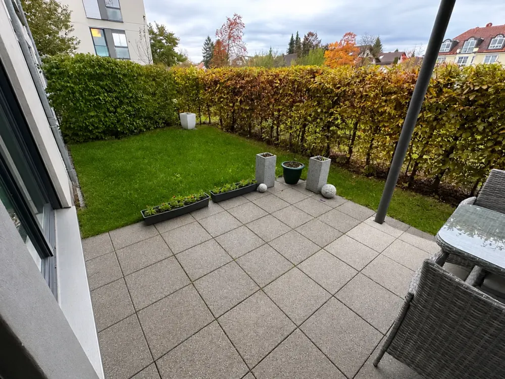 Erdgeschosswohnung mit Garten & Balkon in zentraler Lage - inklusive Einbauküche