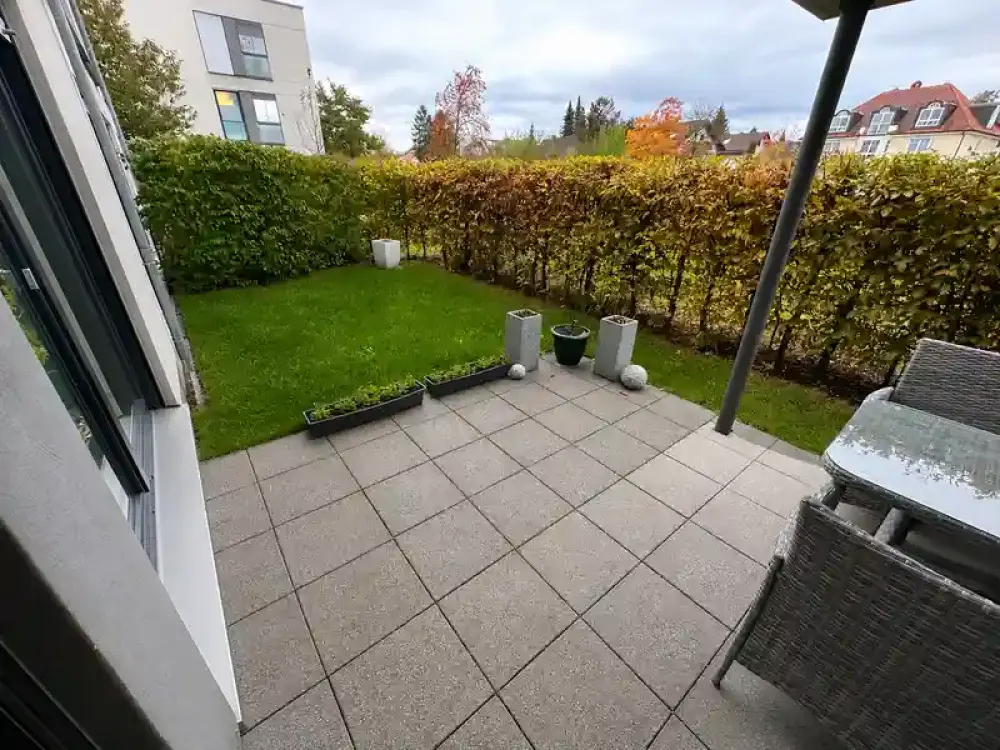 Erdgeschosswohnung mit Garten & Balkon in zentraler Lage - inklusive Einbauküche