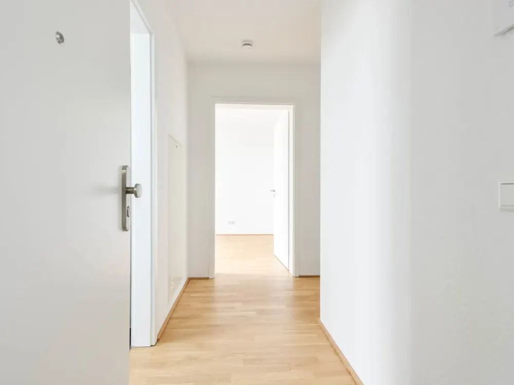 O-Quartier. Moderne 3-Zimmer-Erdgeschosswohnung mit Terrasse und Garten.