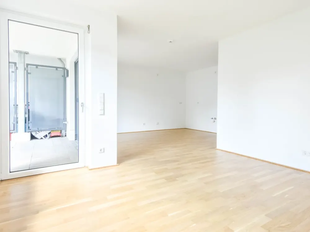 O-Quartier. Moderne 3-Zimmer-Erdgeschosswohnung mit Terrasse und Garten.