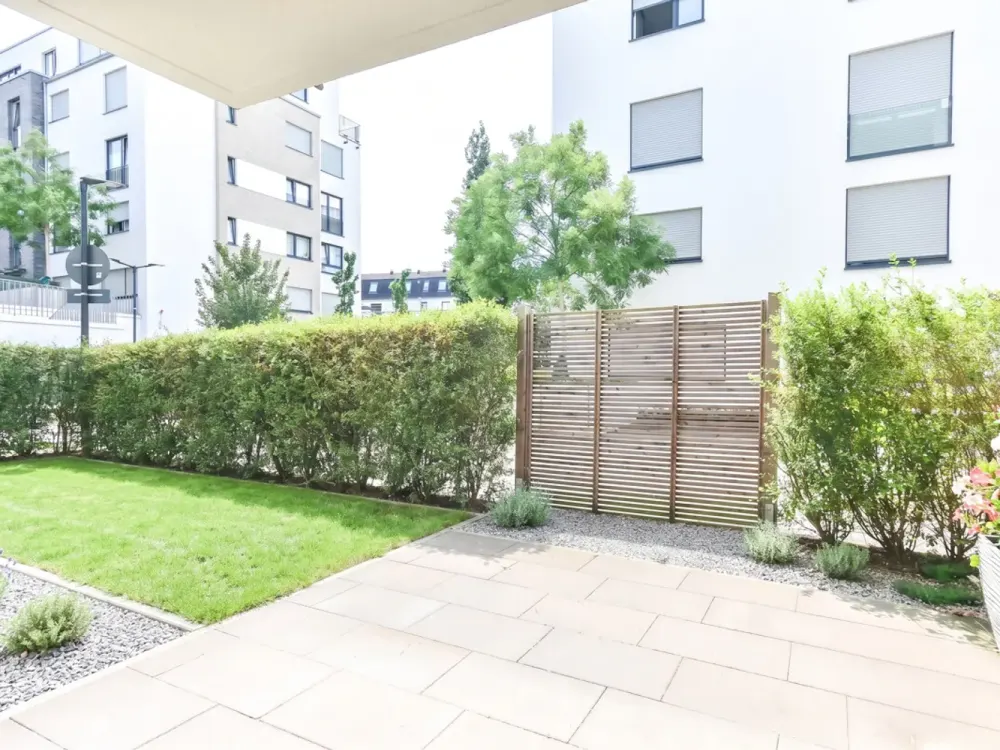 O-Quartier. Moderne 3-Zimmer-Erdgeschosswohnung mit Terrasse und Garten.