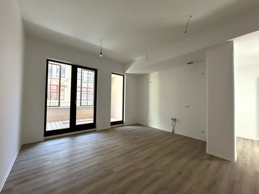 Zentral & stilvoll, 3-Zimmer-Wohnung mit Loggia im sanierten Altbau | Optional mit EBK