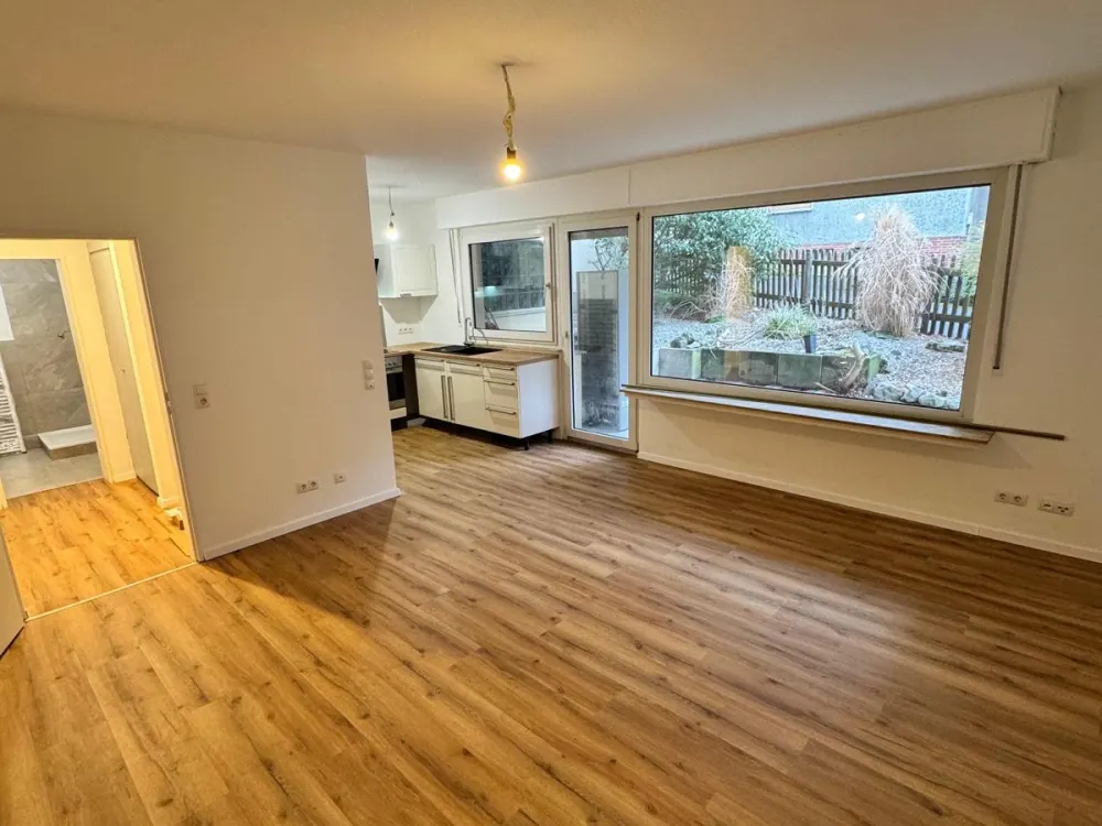 Kernsaniertes 1-Zimmer-Apartment mit Terrasse & Stellplatz