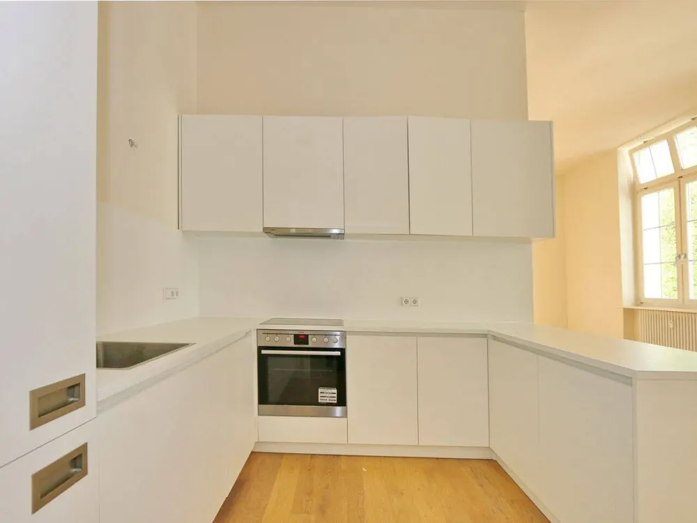 PARAGON APARTMENTS - Attraktive Wohnung in der Danziger Straße mit EBK & Parkett
