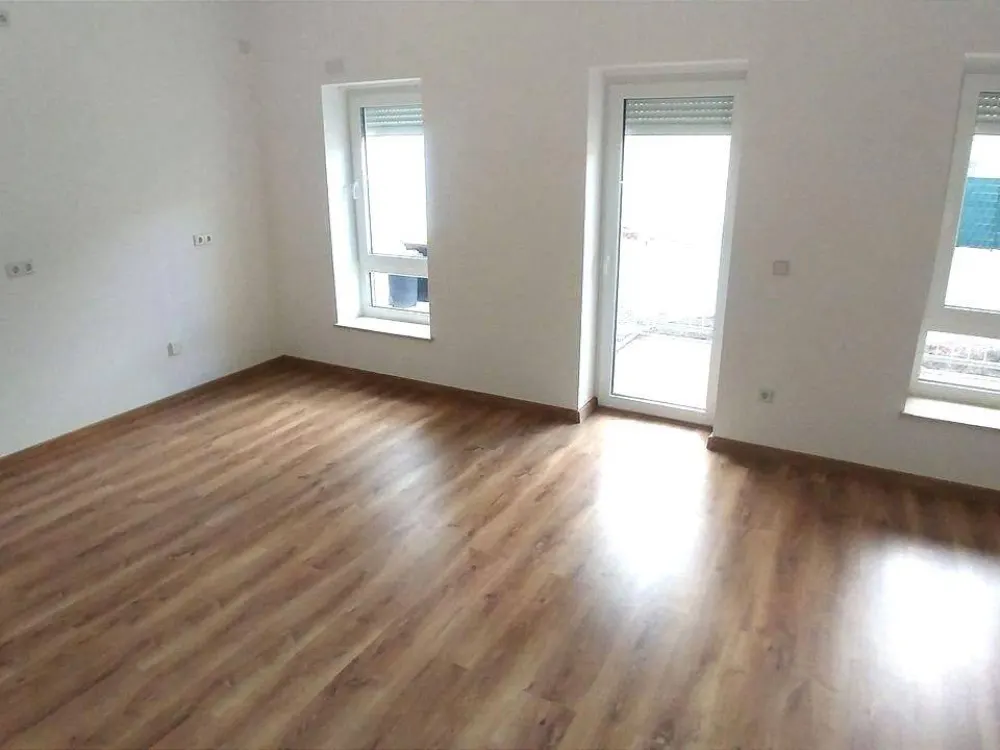 3-Room Apartment with Balcony and Parking Space