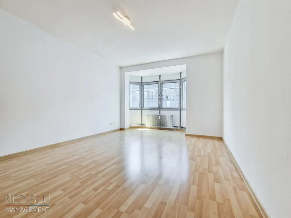 Zentrale 3,5-Zimmer-Wohnung mit Grünblick und zwei sonnigen Balkonen