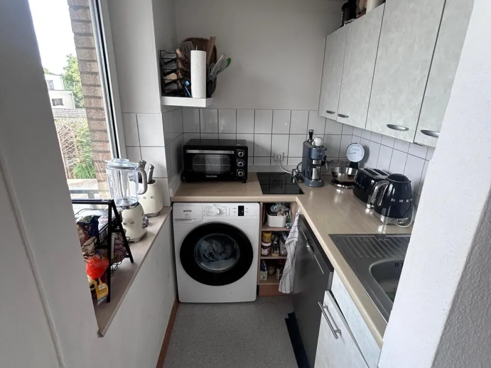 2-Room Apartment with Balcony and Duplex Garage