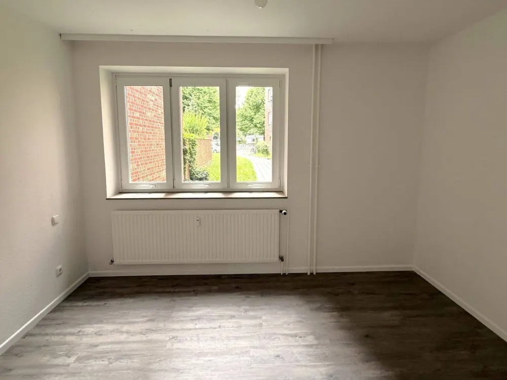 Rollstuhlgerechte Wohnung mit Stellplatz vor der Tür und Terrasse!