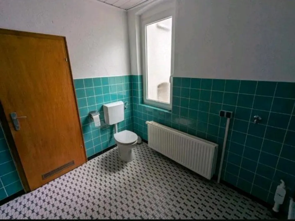 4-room apartment in Niederzwehren with shared garden use