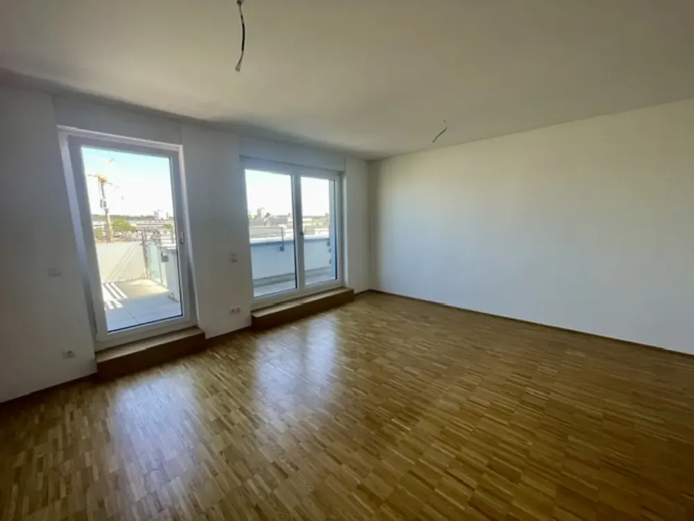 Lichtdurchflutete 3-Zimmer-Wohnung mit großer Dachterrasse