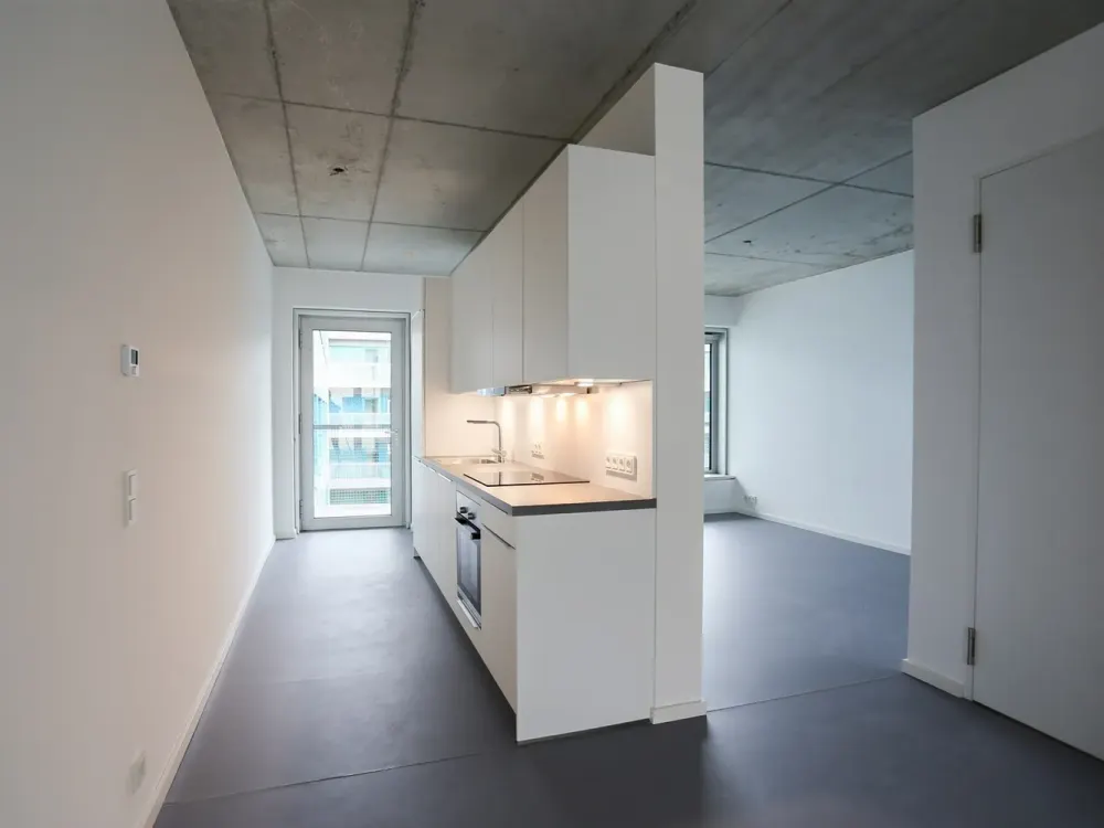 Traumhaft helle Citywohnung mit stylischen Sichtbetondecken im 6. OG eines modernen Neubaus