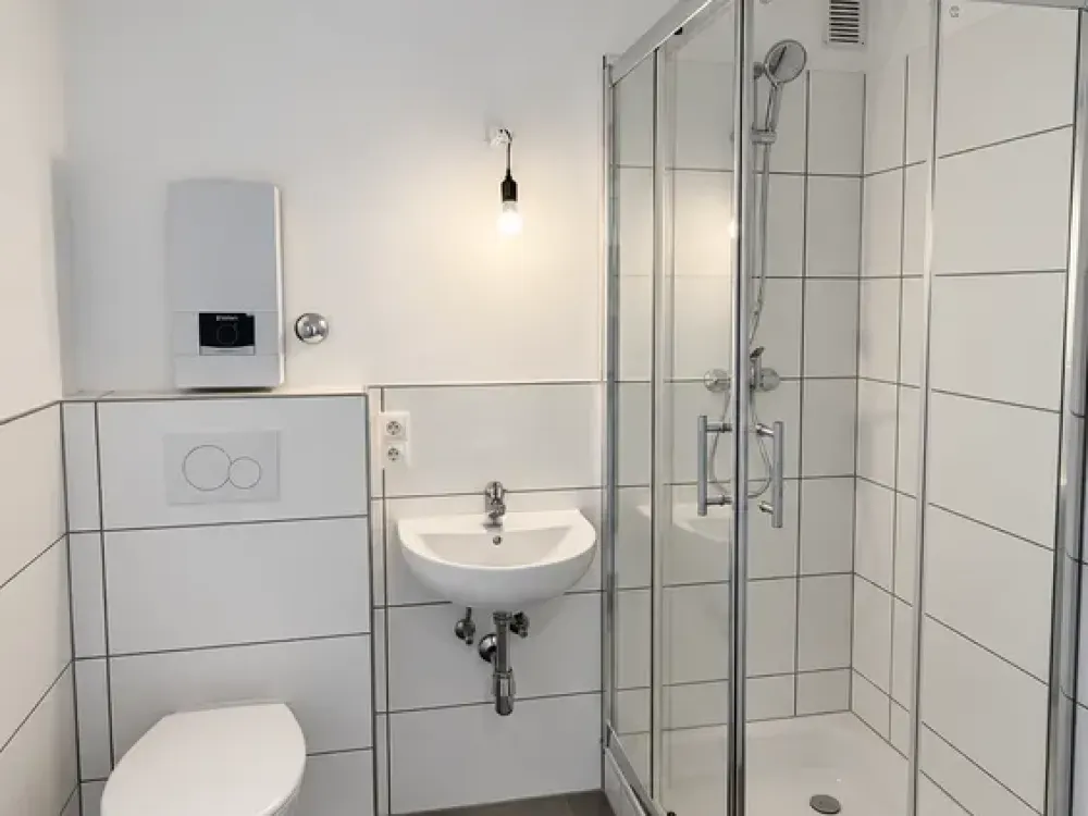 Freshly Renovated Apartment with New Kitchen, New Shower Bathroom and West Balcony