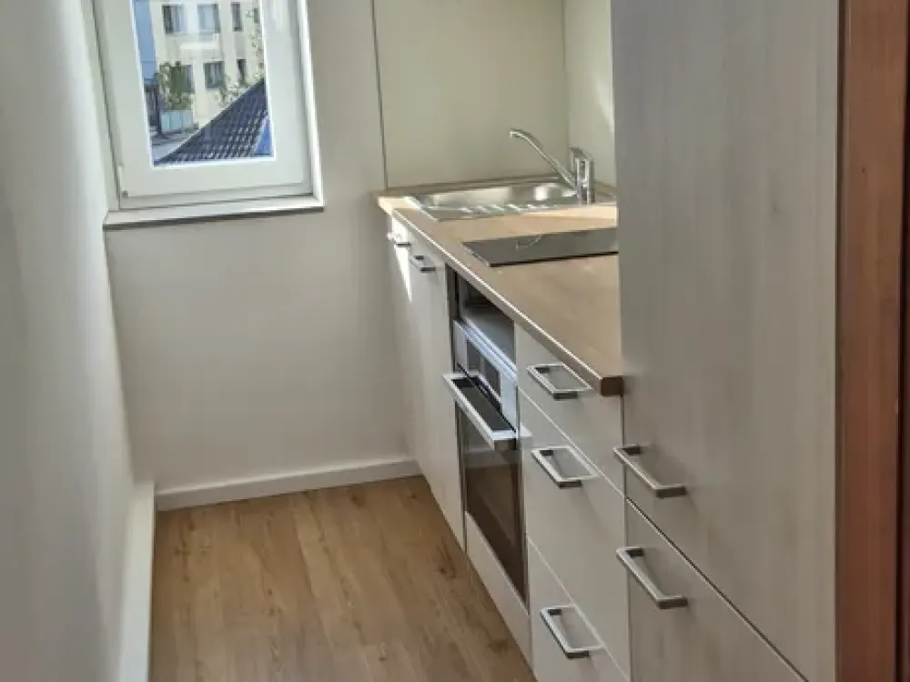 Helle 2 Zimmer Wohnung mit Einbauküche mitten in Merheim