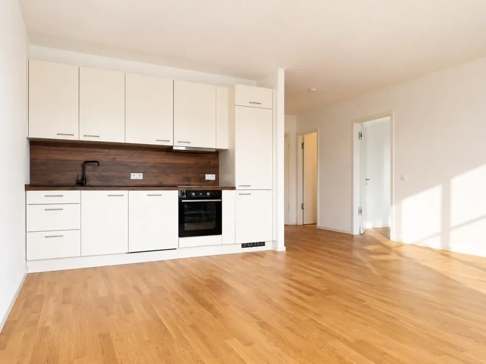 2-Zimmer-Neubauwohnung mit EBK, Balkon & Tiefgaragenstellplatz