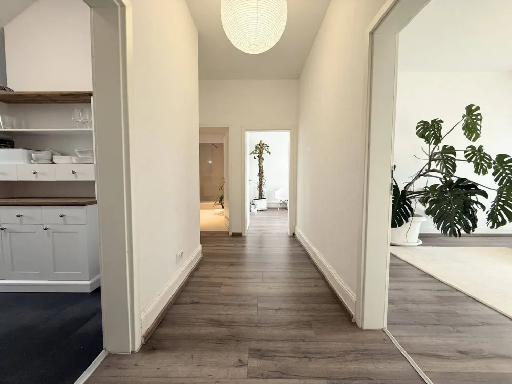 Geschmackvoll möblierte Dachgeschosswohnung mit besonderem Altbauflair