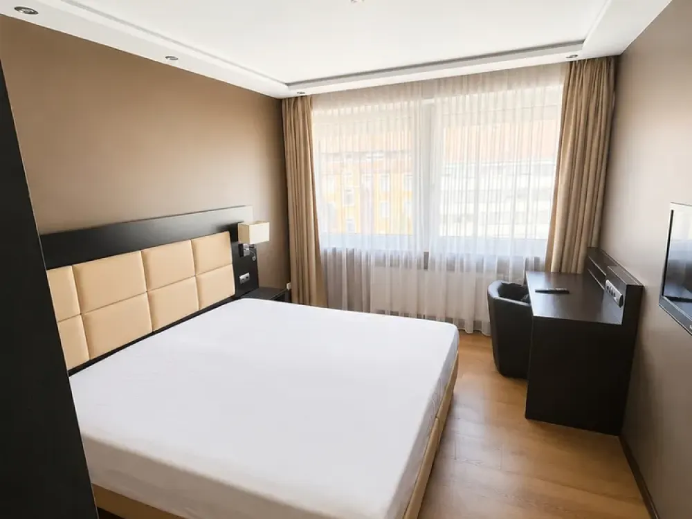 Hotel atmosphere: fully furnished former hotel room in Karlsruhe for rent.
