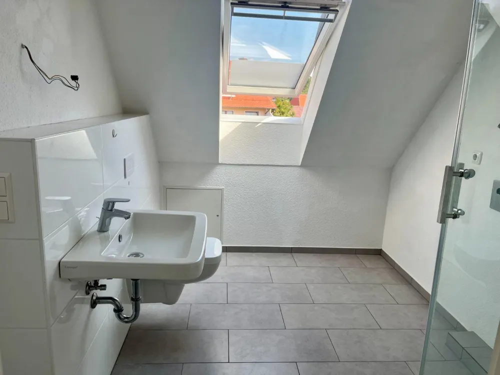 Dachgeschosswohnung mit Einbauküche und Dachterrasse in Stöcken zu vermieten!