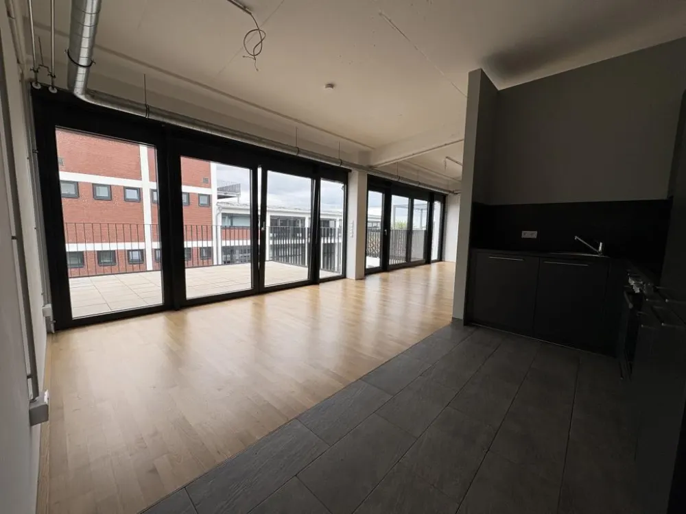 Loft apartment in the popular Tabakquartier. Modern living with fitted kitchen and parquet flooring